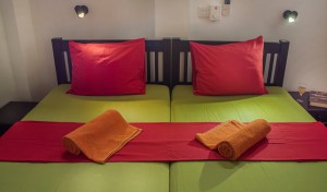 Close-up picture of beds in an apartment.