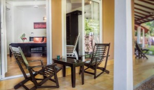 A picture of chairs and tables outside the studio.